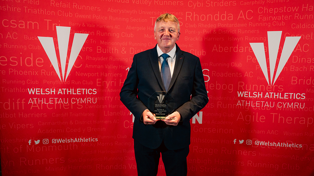 Steve Hames smiling with his award